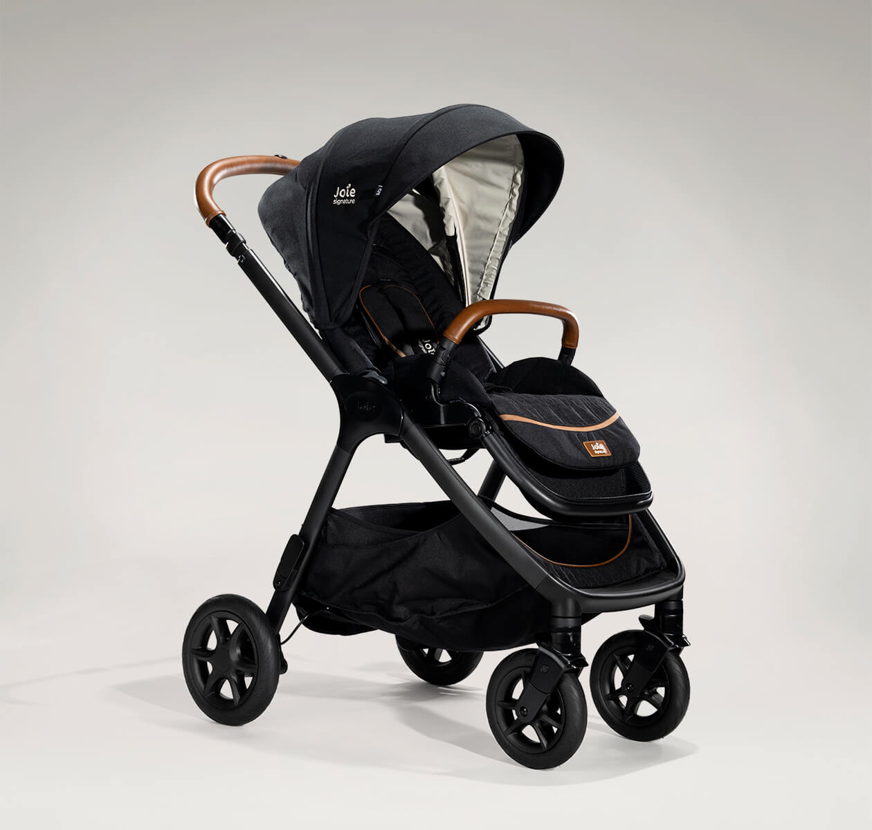 Joie finiti pram in black at an angle.